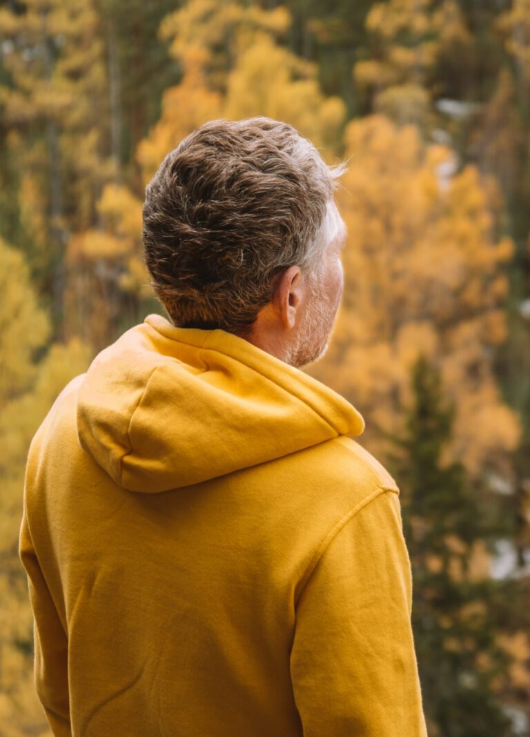 Gambling addiction feature image man overlooking forest