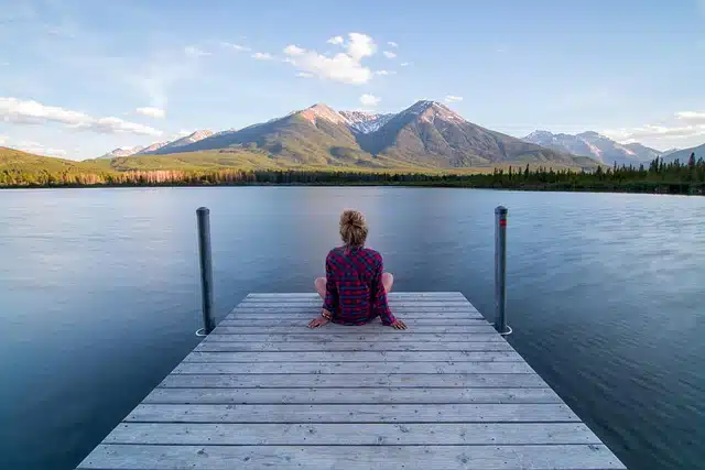 Professional experiencing signs and symptoms of burnout at work in a calm recovery setting